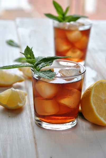 Glasses of ice tea with mint — Stock Photo, Image