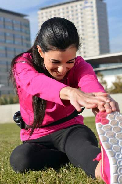 woman practicing running in the city