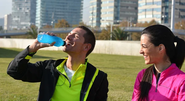 Pareja practicando running — Foto de Stock