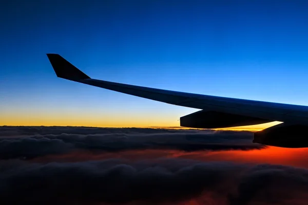 Sunrise view from airplane — Stock Photo, Image
