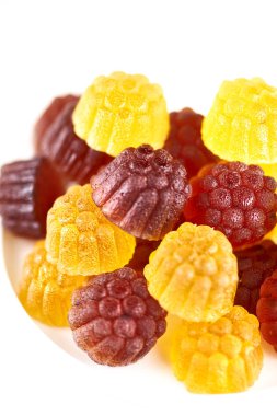 Çok renkli marmelat, renkli şeker koleksiyonu bir ışık masasında. seçici odak