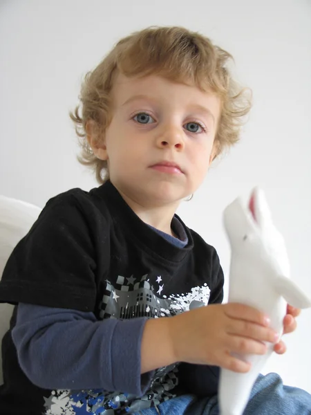 Cute Boy Holds Whale Toy — Stock Photo, Image