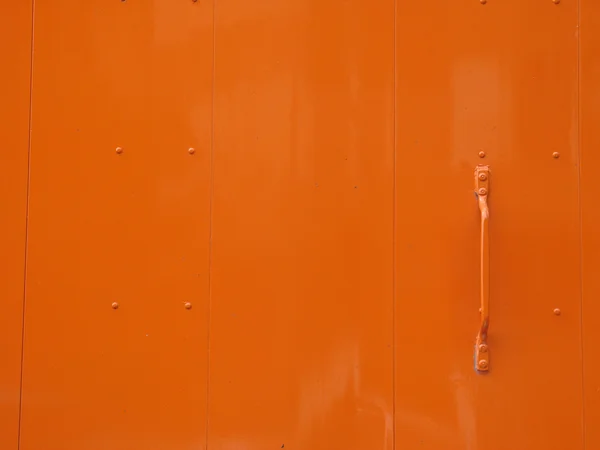 Porta de metal laranja — Fotografia de Stock