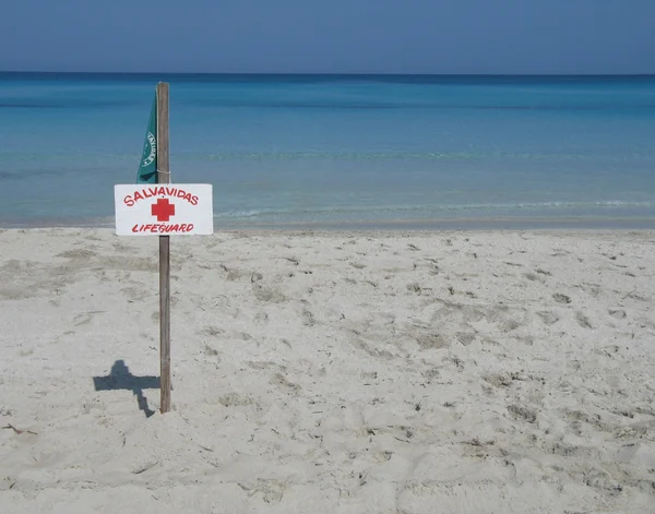 Lifeguard Sign On Tropical Beach — Stock Photo, Image