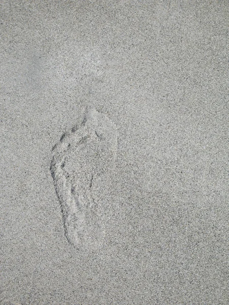 Voetafdruk in het zand — Stockfoto