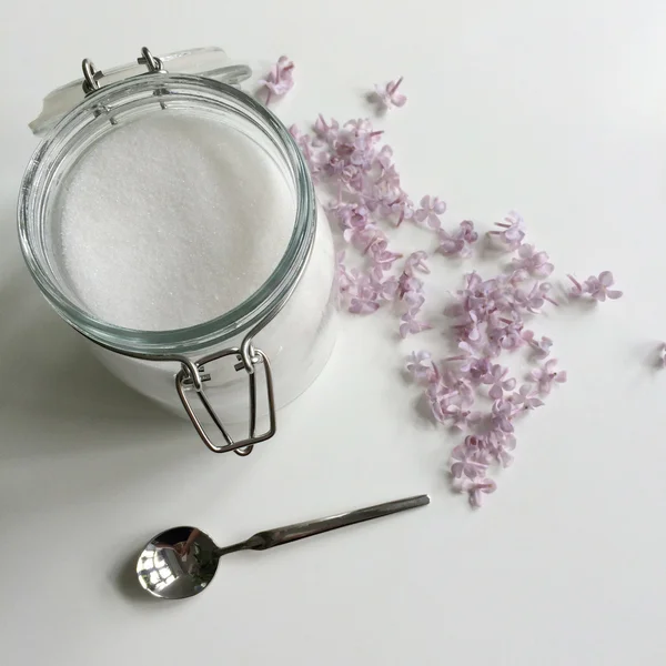 Glass jar of white sugar — Stock Photo, Image