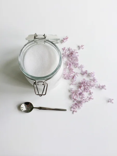 Glass jar of white sugar — Stock Photo, Image