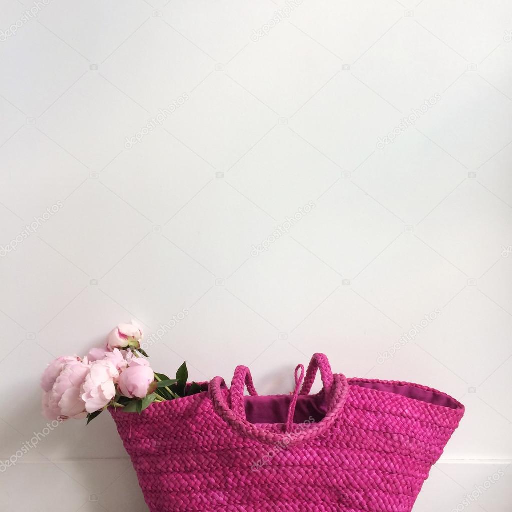 Bouquet of peonies in a bag