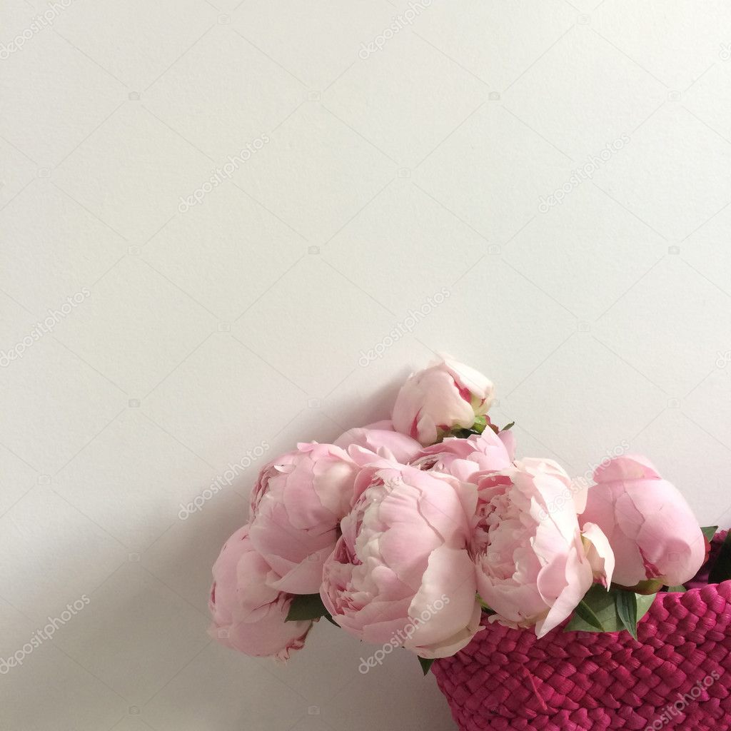 Bouquet of peonies in a bag