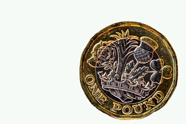 Close One Pound Coin Standing Its Edge Plain White Background — Foto de Stock