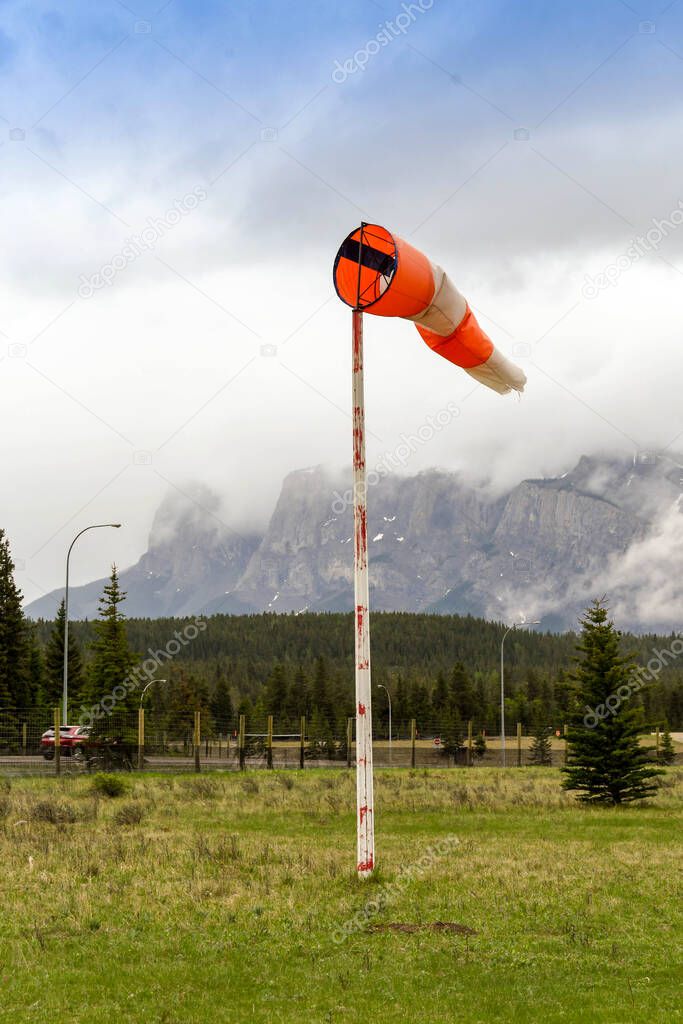 CANMORE, AB, CANADA - JUNE 2018: Wind sock on an emergency landing strip on the outskirts of Banff.