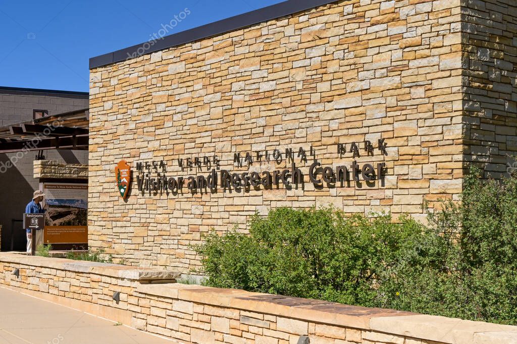 Montezuma County, Colorado, USA - 24 May 2025: Sign on the outside of the Mesa Verde Visitor and Research Center, which is operated by the National Park Service.