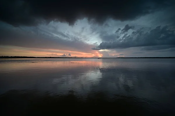 Distant kayaker on Coot Bay in Everglades National Park at sunset. — Foto de Stock