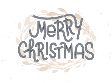 Neşeli Noel yazı altındaki altın bir çelenk ile. Typogra