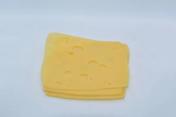 Gele Kaas Met Gaten Witte Achtergrond — Stockfoto