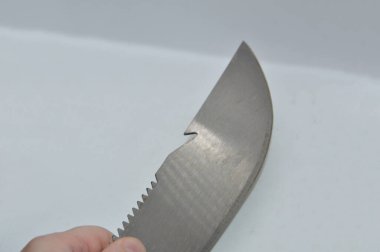 Bıçak sapı ve sapı beyaz arka planda.