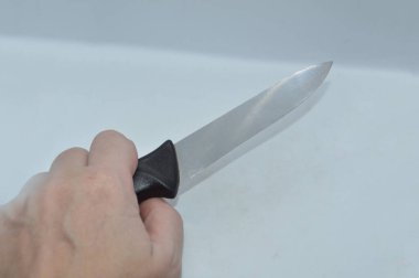 Bıçak sapı ve sapı beyaz arka planda.