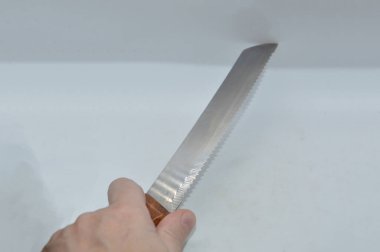 Bıçak sapı ve sapı beyaz arka planda.