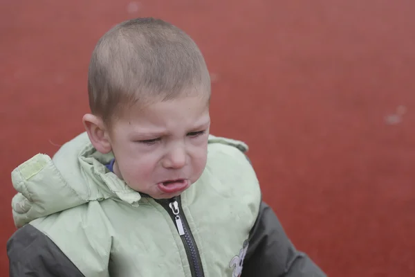 Toddler child crying outside in playground — Stock Photo, Image