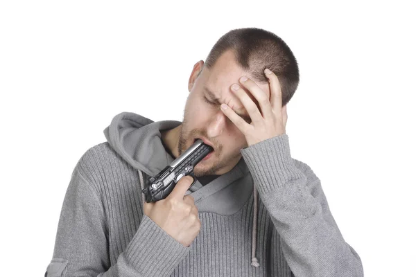 Man with gun wants to commit suicide — Stock Photo, Image