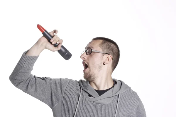Man Holding a Microphone and Singing — Stock Photo, Image