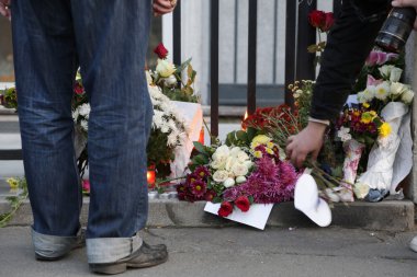 People in Belgrade Pay tribute to the victims in Paris clipart