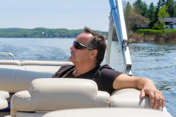 Men 60 years old relaxing on a boat — Stock Photo, Image