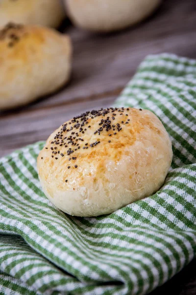 Homemade bread roll on table — Stock Photo, Image