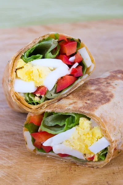 Egg cheese and pepper sandwich wrap in tortilla — Stock Photo, Image