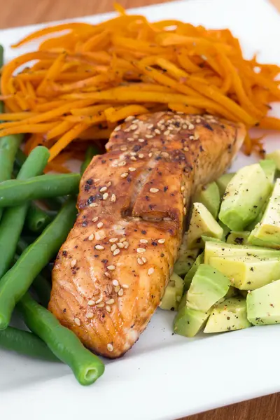 Balsamic and maple salmon dish with bean avocado and yam — Stock Photo, Image