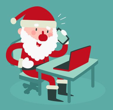 Cep telefonu bilgisayar başında tutan şirin Noel Baba