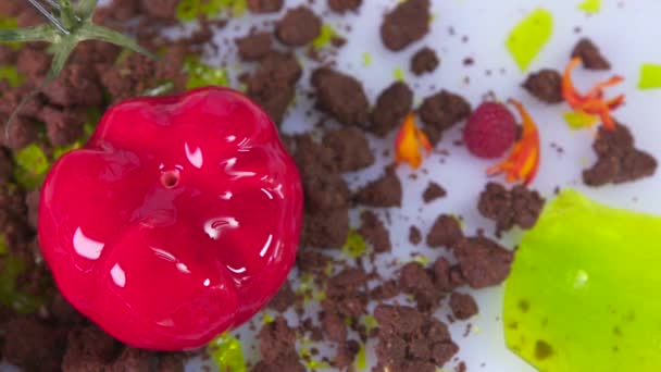 Pastry chef preparing a dessert. Cooking a red dessert. Tomato dessert slow motion close up