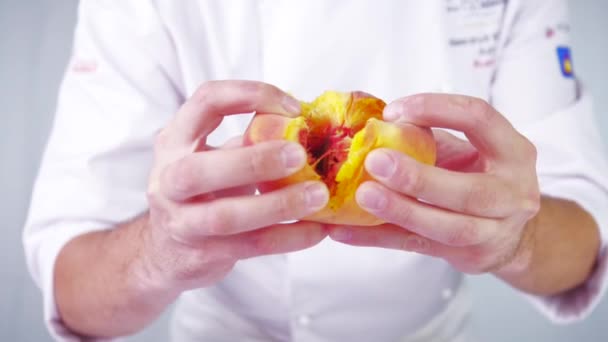 Someone Breaking Peach Half Slow Motion Pastry Chef Preparing Fruit — Stock Video