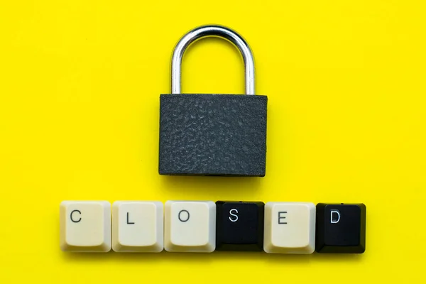 Closed Padlock Keys Yellow Background Bottom Inscription Closed Laid Out — Stock Photo, Image