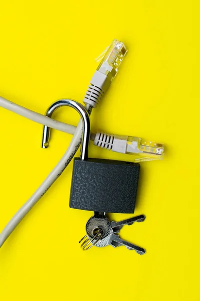 Internet Cable Passing Open Iron Lock Keys Yellow Background Data — Stock Photo, Image