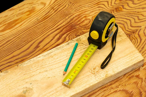 Unfolded Measuring Tape Wooden Board High Quality Photo — Stock Photo, Image