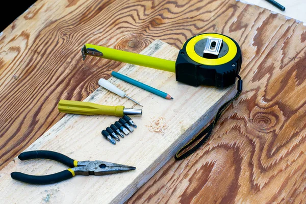 Measuring Tape Pliers Pencil Screwdrivers Board Carpenter Workbench High Quality — Stock Photo, Image