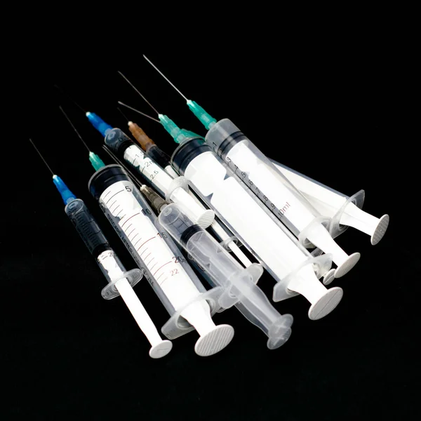 Syringes Different Sizes Black Background High Quality Photo — Stock Photo, Image