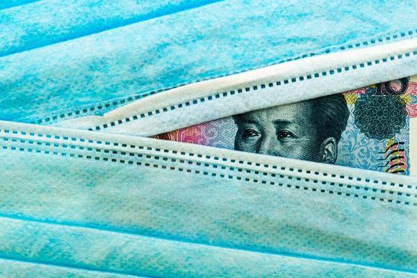 Chinese Yuan Currency Peeks Out Medical Hygiene Masks High Quality — Stock fotografie