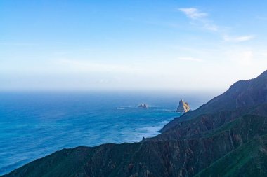 The beautiful Anaga mountains near Tangana with the rocks Los Galiones in the sea, Tenerife, Spain