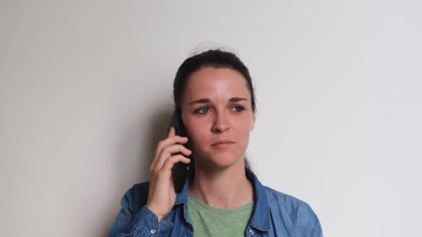 Young Caucasian European Woman Shirt White Background Calls Her Mobile — Stock Video