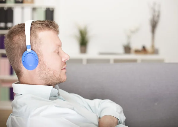 Young man enjoying his music — Stock Photo, Image