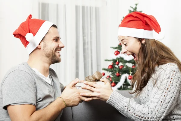 Young girl is excited about gift of boyfriend — Stock Photo, Image