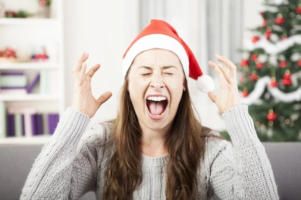 Jovem grito por causa do estresse de Natal Fotos De Bancos De Imagens