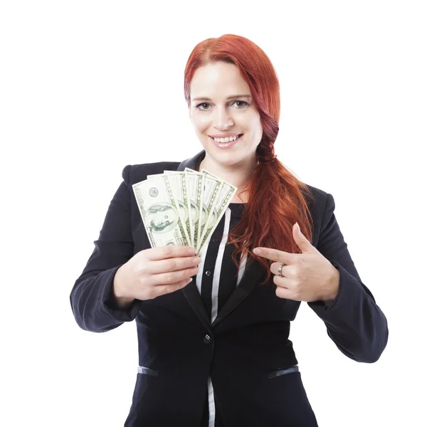 Mulher de negócios apontam para um monte de notas de banco dólar — Fotografia de Stock