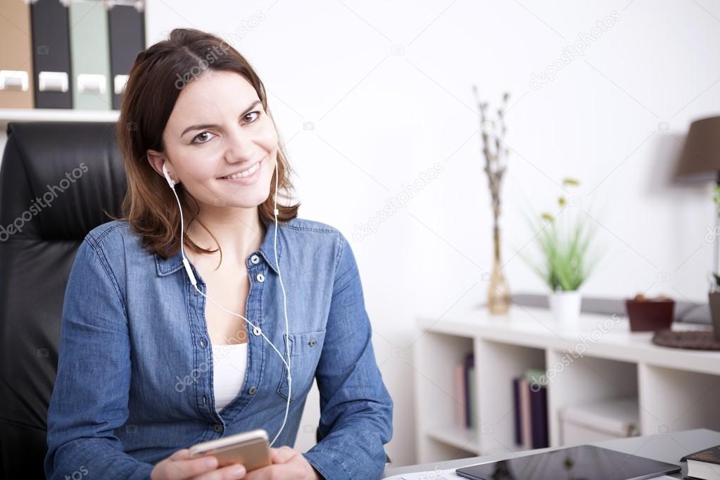 Pretty Office Woman Listening Music From Phone