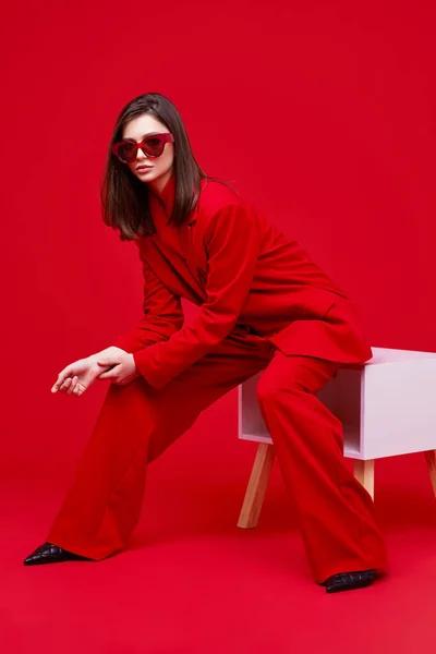 Fashion Model Red Suit Sunglasses Studio Shot — Stock Photo, Image