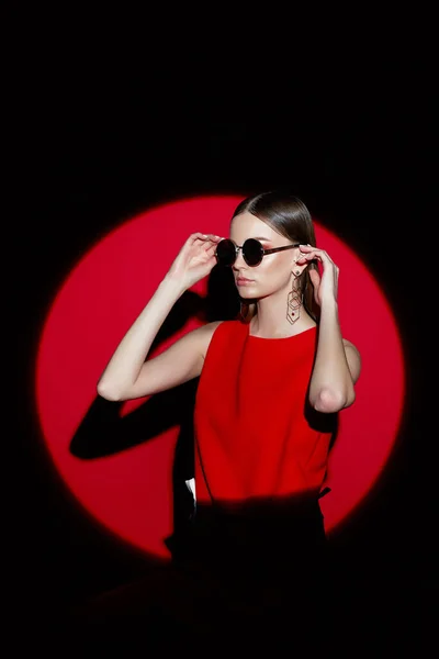 Fashion Portrait Young Woman Red Dress Sunglasses Red Background Spotlight — Stock Photo, Image