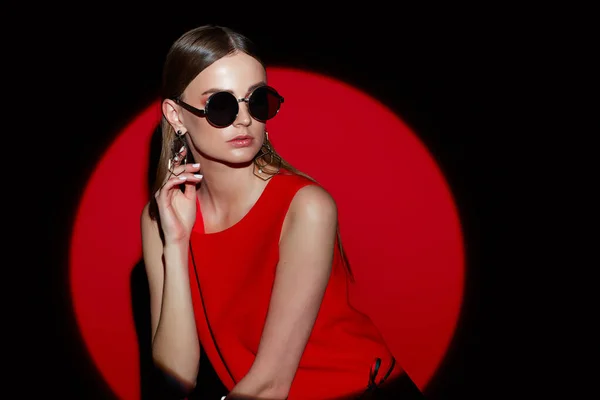 Fashion Portrait Young Woman Red Dress Sunglasses Red Background Spotlight — Stock Photo, Image