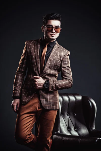 Portrait of handsome stylish man in elegant brown jacket — Stock Photo, Image